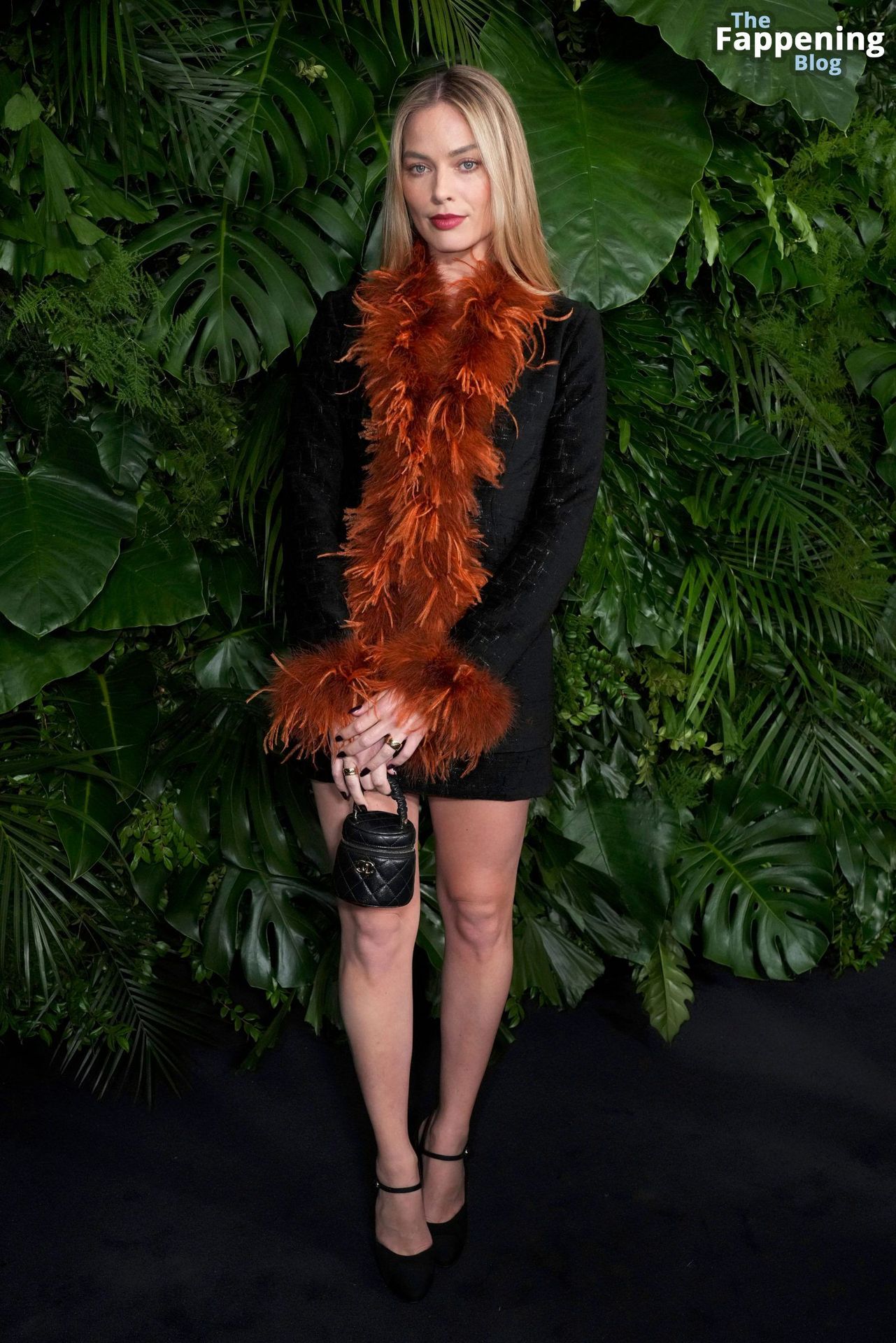 Margot Robbie Shows Her Sexy Legs & Panties at the Chanel’s Pre-Oscar Event in LA (16 Photos)